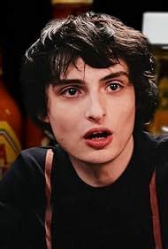 phil wolfhard|Finn Wolfhard Embraces Insanity While Eating Spicy Wings.